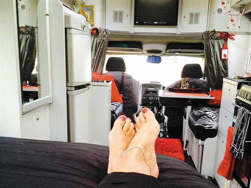 Dianna -puts -her -feet -up -in -her -cosy -motorhome