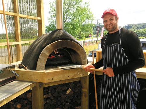 Jason -preparing -the -fire -in -the -pizza -oven