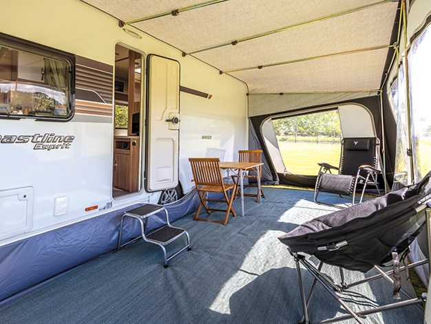 A large inflatable awning adds an extra room