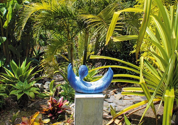 Ceramic art by Ivan Vostinar(above and below) provides a pop of colour amongst the greenery at Paloma