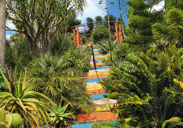 Colourful steps lead to a steel sculpture by Steuart Welch (Paloma)
