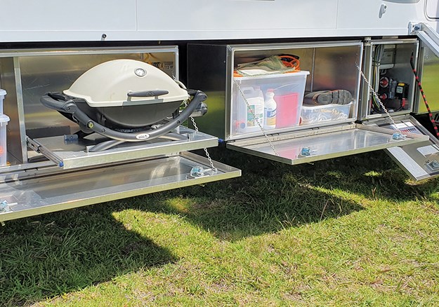 Outside, there's plenty of storage including a dedicated locker for the Weber BBQ