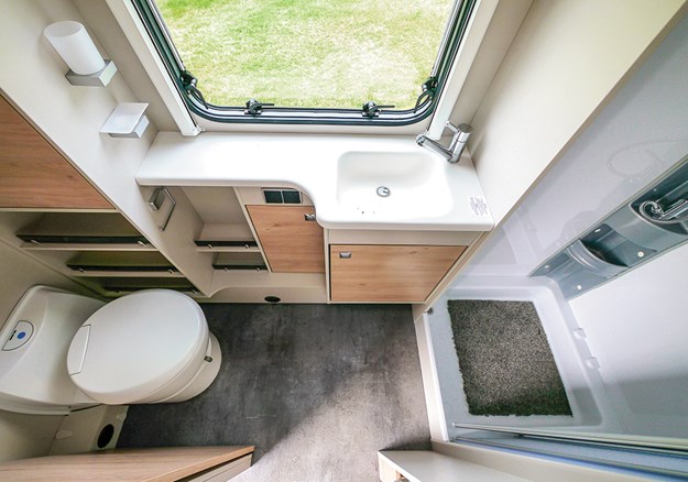 The bathroom runs the full width of the caravan, offering a generous amount of space